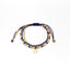 Pulsera Julieta triple tonos beige y azul: arbolito, luna, elefante